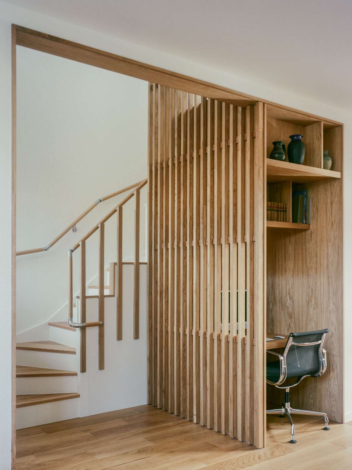 Details like this inset cookbook rack add discreet function and character to this kitchen in Brighton's Elm Grove. 