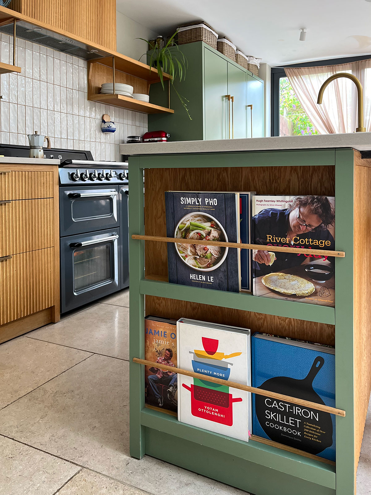 Details like this inset cookbook rack add discreet function and character to this kitchen in Brighton's Elm Grove. 