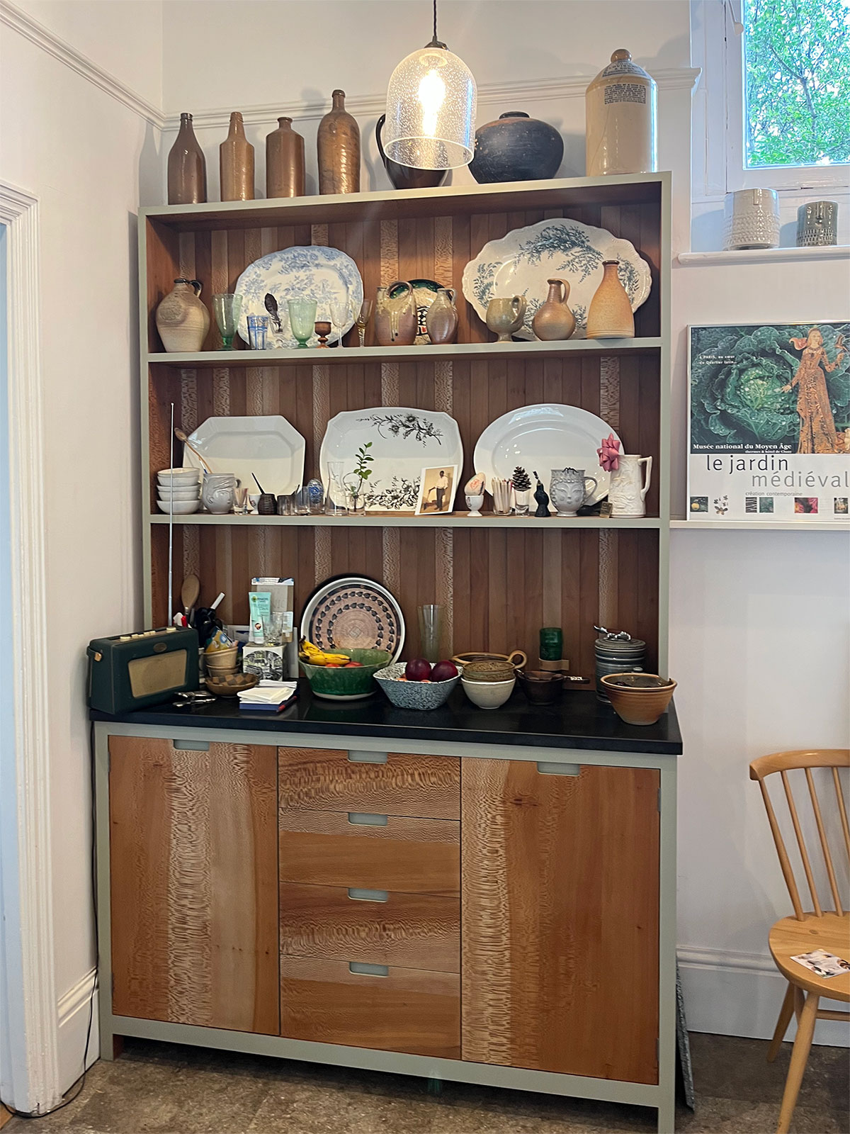 A stand-alone dresser adds additional storgage and display space.