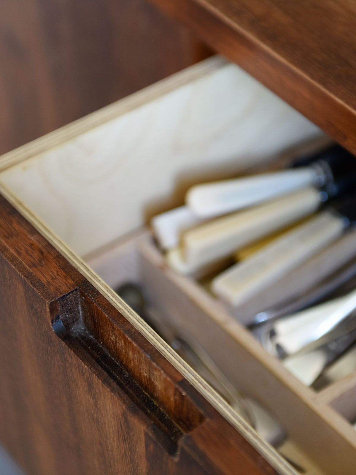 Detail of handle indent in kitchen drawers.